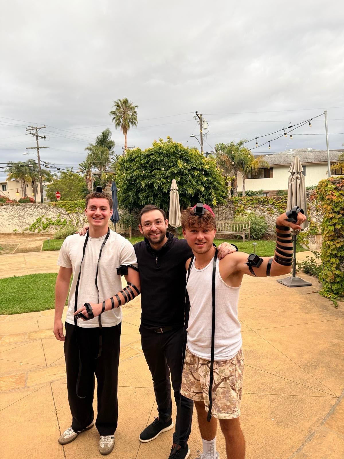 Young men wearing tefillin outdoors